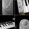 ポータブル折りピアノの折りたたみ式49の鍵の柔軟な柔らかい電気デジタルロールアップキーボードの拡声スピックの学習電子楽器