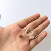 100 adet 20x24x6mm Mantarlı Küçük Cam Şişeler DIY Mini Kalp Şekilli Sanat Kavanoz Hediyeler Şişeler Güzel Kolye Şişeler