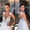 2019 Sexy Deep V Neck Boho Hobe une ligne en tulle avec des applications florales 3D Boues de mariée de jardin de plage perlé Vestido de Novia