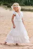 2019 Billiga Boho Beach Flower Girls Dresses Lace Appliques V Neck Kortärmad Tiered V Tillbaka Med Båge Barn Kids Party Communion Grows