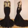 Verkliga bilder 2019 Designer Black Mermaid Prom Klänningar med guld Lace Appliqued Sexig Backless Långärmade Kvällar Vestidos BC1255