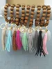 Cross-border hand-beaded wooden bead elastic rope bracelet keychain accessories tassel pendant