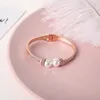Bracciale con zirconi intarsiati di perle esagerate dal design creativo, braccialetto da sposa in oro rosa di moda di lusso squisito, braccialetto regalo di gioielli per le vacanze