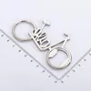 100 stks nieuwe creatieve metalen liefde fiets bierflesopener bruiloft gunsten promotionele geschenken keuken bar gereedschap