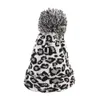 Moda Mulheres Leopardo Faux Peles Bola de Inverno Quente Crochet Chapéu de Chapéu Beanie para Mulheres Chapéu Gorras