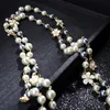 Großhandels-Luxusdesigner schöne Blumen klassische elegante Perlen mehrschichtige lange Pullover-Statement-Halskette für Frau