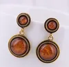 Pendientes de tuerca Vintage para mujer, pendientes marrones para mujer, pendientes redondos de piedra de resina, joyería de moda, Brincos femeninos