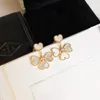 Fashion-2020 new white heart four-heart earrings S925 silver plated 18-carat gold friary stylish female earrings classic style with gift box