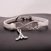 Gioielli di moda Argento antico Hockey Sport Bracciale con ciondolo Bracciale con ciondoli Gioielli Corda di velluto misto Infinity Love 8 Bangle -273S