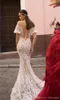 Sexy Gorgeous Mermaid Wedding Dresses New Illusion Bodice Sheer Off Shoulder Lace Applique Button Covered Back Long Bridal Gowns vestidos