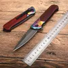 Coltello chiudibile ad apertura assistita 440C Lama rivestita in titanio Manico in legno + acciaio Sopravvivenza in campeggio all'aperto Coltelli pieghevoli tascabili EDC