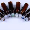 10 Stück natürliche Edelsteinfelsen, Quarz-Rollerball auf nachfüllbaren leeren Flaschen für ätherische Öle, bernsteinfarbenes Glas, 10 ml Kristallsplitter im Inneren301G