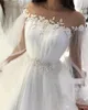 Romantyczne arabskie suknie ślubne z długim rękawem Sheer Neck Side Split Aplikacje Perły Koraliki Kraj Weddowanie Suknie Ślubne Vestidos De Novia