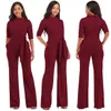 Europeiska våren och sommartrenden Solid Color Pullover Lapels Half Sleeve Slim Pocket Belt Jumpsuit Support Mixed Batch