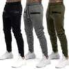 Nuevos pantalones ajustados de gimnasio para hombre, pantalones de chándal, chándal, pantalones deportivos ajustados, pantalones largos, pantalón informal para hombre con bolsillos de talla grande