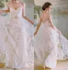 Fairy Lace Bröllopsklänning Ny ankomst Sweetheart Ärmlös Backless Sweep Train Floral Lace med Applique Brudklänningar