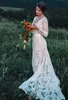 En linje vit spets långärmad strand bohemian bröllopsklänning klänning baklöst boho brudklänningar