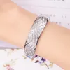 Chaîne de luxe ligne ondulée réglage du canal bracelet de fiançailles plaqué or blanc CZ pour les accessoires de mariage des femmes