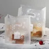 50PcsLot sacs cadeaux de noël en plastique Boutique pochettes Shopping cadeau paquet sac fournitures poignée flocon de neige présent New5029728