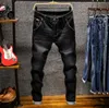 jeans ajustados de motorista de hombre