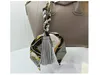 Lente en zomer lederen zijde sjaal kwast hanger dames mode creatieve tas accessoires sleutelhanger sleutelhanger hanger