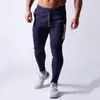 Svart joggare byxor män sweatpants bomull spårpants casual skinny byxor manlig gym fitness träning höst springa sportkläder