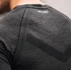 Mężczyźni Running Tight Krótki Koszulka Kompresja Szybki Dry T Shirt Męski Gym Fitness Bodybuilding Jogging Man Tees Topy Odzież marki