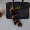 Real äkta räv Americal Raccoon päls svans keychain handväska charmtassel cosplay verktyg bil nyckelring hängande nyckel ring smycken gåva