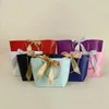 100pcs Papiergeschenke Taschen mit Griffen reine Farbe 10 Farben Kleidung Schuh Einkaufstasche Geschenkwrap 21x7x17cm
