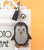 10 unids/lote llavero de pingüino estilo coreano mujer hombre Casual cuero de diamantes de imitación lindo Animal llavero bolso encanto moda llavero con borla regalo