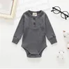 Långärmad bomull Bodysuit Baby Rompers Boys Solid Jumpsuits Nyfödda Triangel Knappar Playsuit Casual Boutique Oneise Cloth Clothes Azyq6674