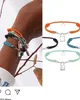 Nuevas mujeres Amante Brazalete Hecho a mano Cuerda ajustable Pulsera de cadena Encanto Cerradura Colgante Titanio Acero inoxidable para regalo Con letra 7 colores