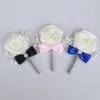 アイボリークリームサテンフラワーグラウンドBoutonniere Bow Tie Pearlビーズ花嫁のウェディングドレスコサージュピンブローチ