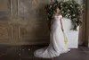 2020 Abiti da sposa a sirena Bateau Appliqued Pizzo Abito da sposa increspato Ruffle Illusion Backless Corte dei treni Robes De Mari￩e