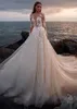 Abiti da sposa sexy a sirena in pizzo bianco Nuovi abiti da sposa con applicazioni a maniche lunghe in maglia trasparente con tulle champagne Vestidos De Soiree