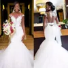 2019 Fit and Flare African Mermaid Wedding Dresses Sheer Neck Cut Out Open Back Lace Appliques Tulle Skirt Capped Shoulder Bridal Gowns