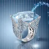 Anelli di cristallo d'argento con taglio principessa in pietra blu di grandi dimensioni per anello di gioielli regalo di compleanno di fidanzamento per ragazze da donna