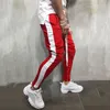 Pantaloni casual da uomo Pantaloni larghi con tasche larghe a righe Pantaloni 2020 Nuovi pantaloni larghi con lacci maschili Pantaloni da jogging Pantaloni sportivi