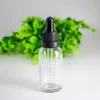 Bouteille de gouttes d'huile essentielle en verre 30 ml d'ambre clair vert bleu 1 oz bouteilles d'huile avec couvercles noirs pour le jus liquide