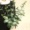 65cmシミュレーション花ユーカリ人工植物緑のユーカリの葉の結婚式の花の家の装飾
