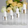 Srebrna czapka Biała guma Top 1 ml 2ml 3 ml 5ml Perfumy Essential Oil Butelki Bursztynowe Szkło Dropopowe Słoiki Butelki Fiolki z pipetą 1200 sztuk