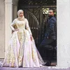 華やかなアラビアプラスサイズの人魚のウェディングドレスは、Mhamad中東のMulsimレースビーズアップリケブライダルガウン列車教会の花嫁のドレス