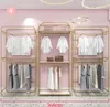 Clothing store display shelf golden floor type double light luxury creative iron hanging clothes rack women's clothing store shelf