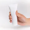 Tube cosmétique en plastique blanc rechargeable baume à lèvres d'essai de récipient d'emballage serré à l'envers à l'envers pour crème pour la crème sol