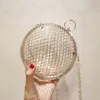 ウェディングジュエリープロムのイブニングパーティーショルダー球袋のための透明なクラッチのファッション金属の円形のハンドバッグの中空