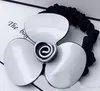 6 5 cm Czarno -biały akrylowy pierścień włosów kamelia gumowe opaski głowice do Ladys Kolekcja Fashion Classic Element