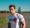 Camiseta de ginástica masculina de manga curta camiseta de algodão estampada casual camiseta fina masculina de fitness para treino de musculação camiseta de verão