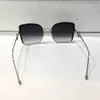 Hurtownie-Sunglasse Dla Kobiet Design Popularne okulary przeciwsłoneczne Urocze okulary przeciwsłoneczne Najwyższej jakości Okulary przeciwsłoneczne Ochrona UV Przychodzą z pakietem