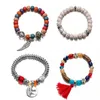 Nieuwe Bohemian Beaded Armband Wings Letter Tassel Flowers Beads Bangle 4pcs / Set Multilayer Stretch Stackable Armbanden Sieraden
