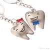 Wholesale Lovely Metal Mini Tooth Keyring Unisex Bag Car Key Chain Accessories Gift 2 Colors Smile Teeth Pendant Keychain DH1215